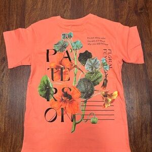Vibrant Orange Short Sleeve Tee with Modern Botanical Art
